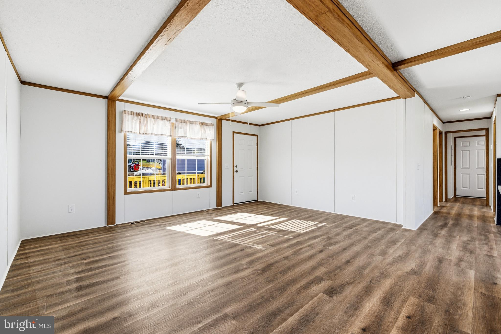 343 Park Road Stanley, VA 22851 - Photo 4 of 48 a view of an empty room with window and wooden floor