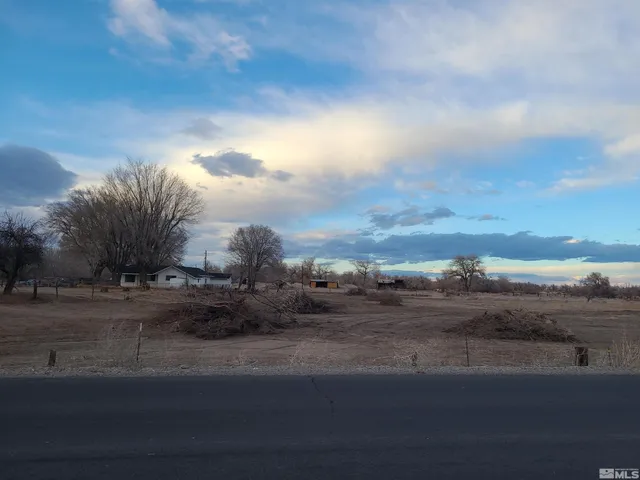 a view of a city and sunset