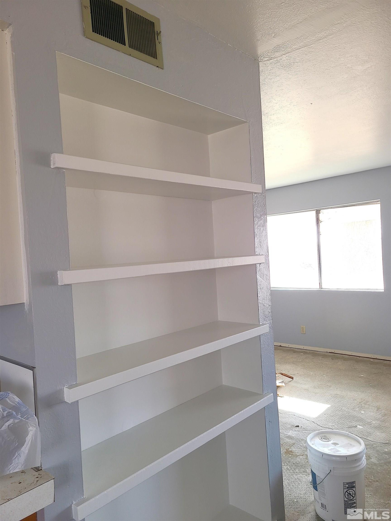 1755 Coleman Road Fallon, NV 89406 - Photo 8 of 12 a bathroom with a sink a toilet and a window