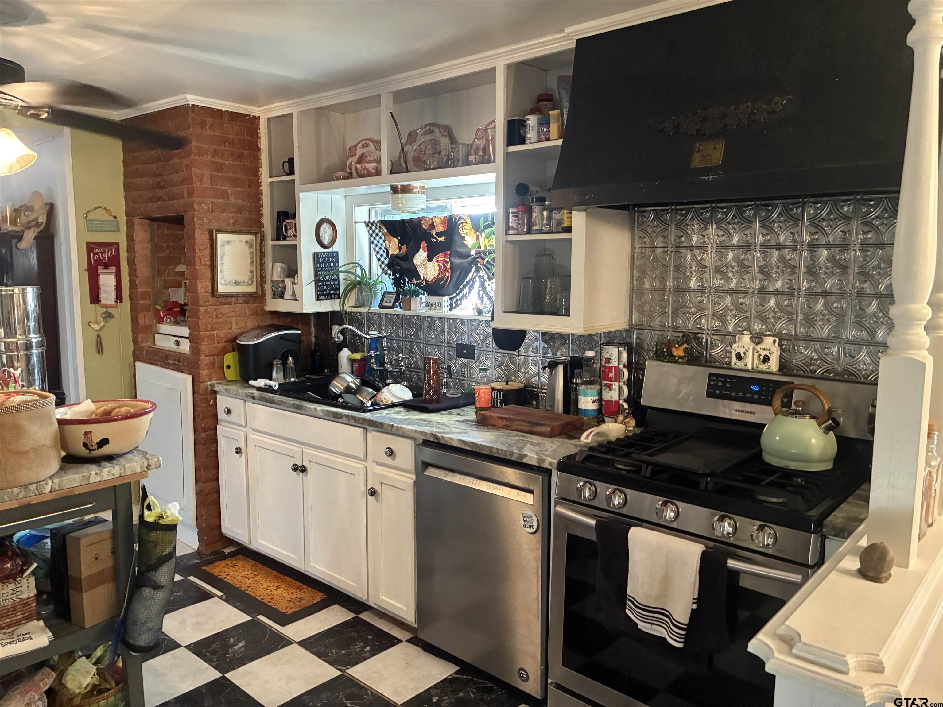 327 Fairview Street Rusk, TX 75785 - Photo 10 of 18 a kitchen with a stove and a sink