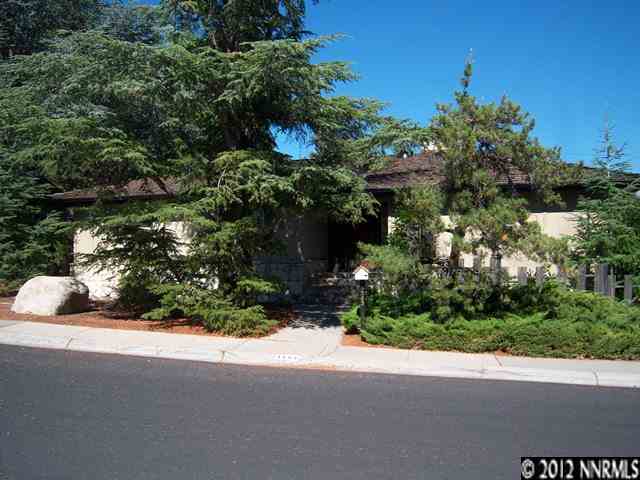 3363 Belford Road Reno, NV 89509 - Photo 1 of 1 a view of a street with a tree