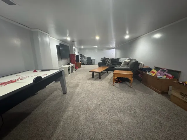 a room with furniture and a chandelier