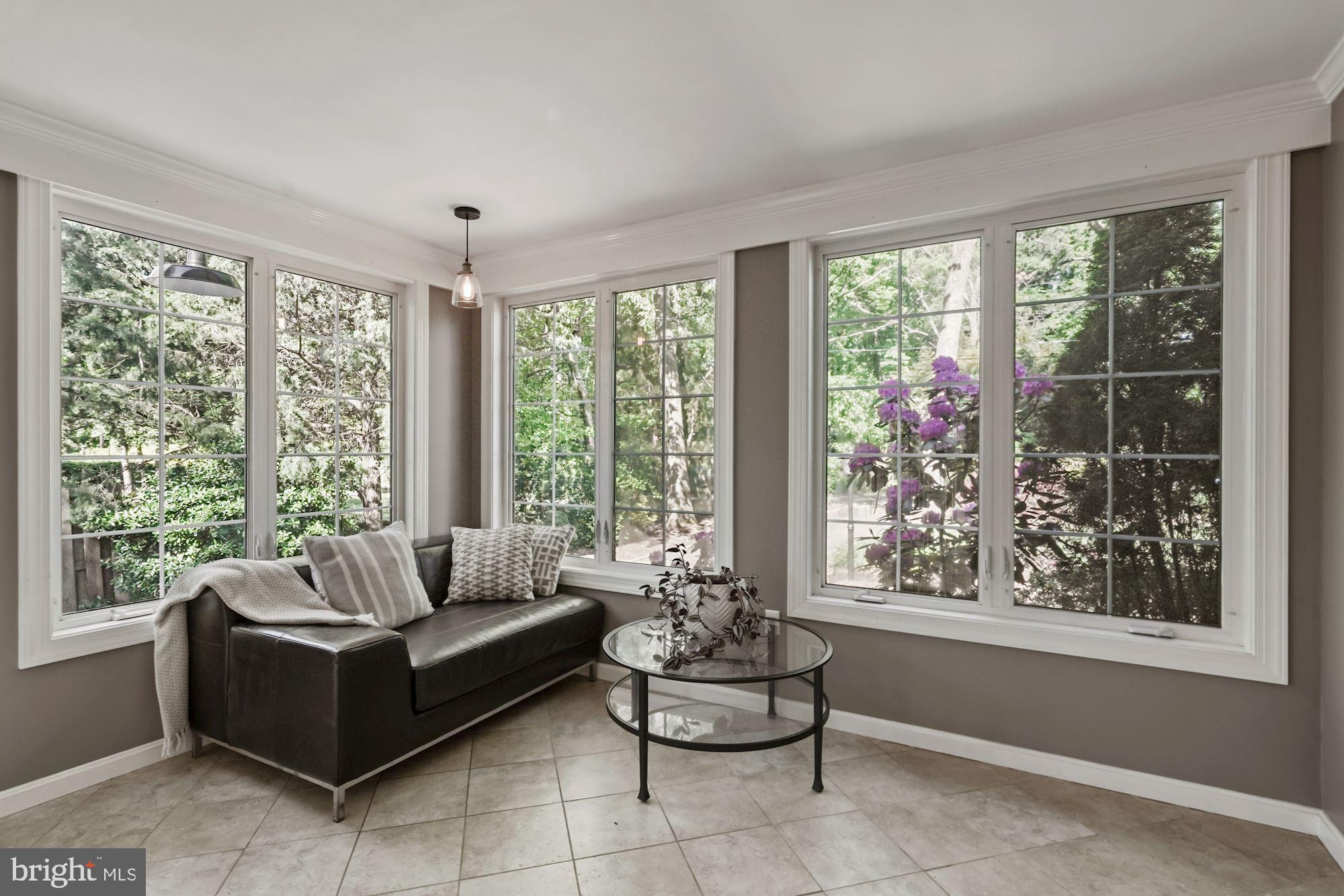 4921 Ridgewood Road Alexandria, VA 22312 - Photo 19 of 48 Den on main level surrounded by windows!!