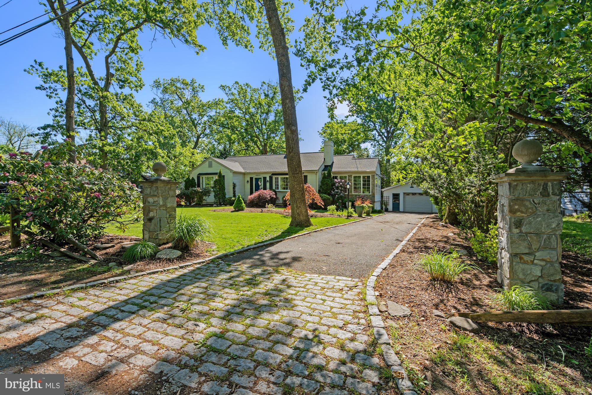 4921 Ridgewood Road Alexandria, VA 22312 - Photo 3 of 48 Two stone pillars flank the driveway