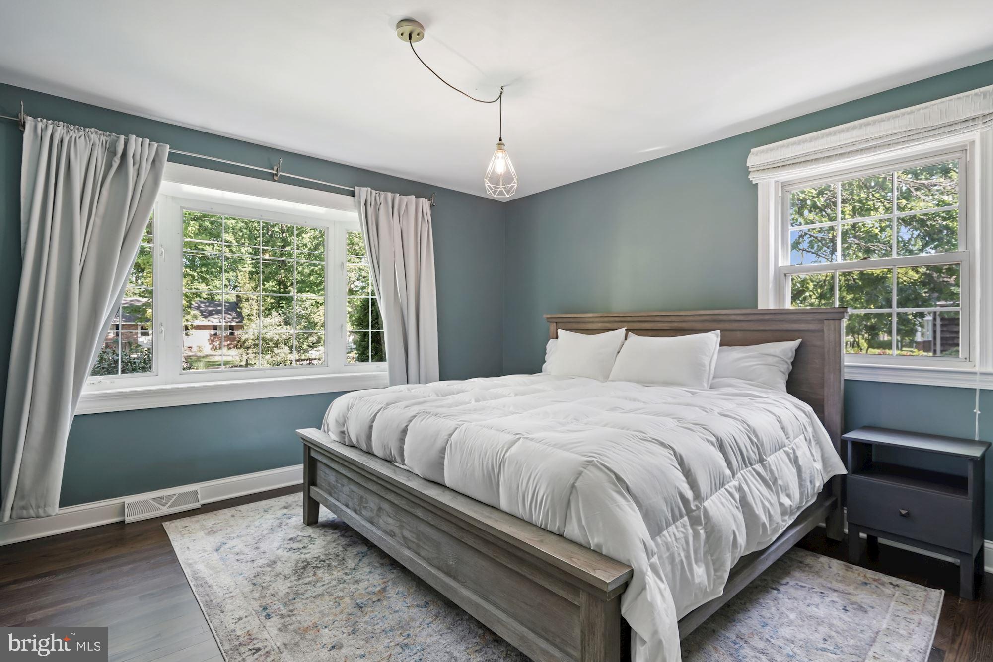 4921 Ridgewood Road Alexandria, VA 22312 - Photo 23 of 48 Primary first floor bedroom; hardwood, new windows