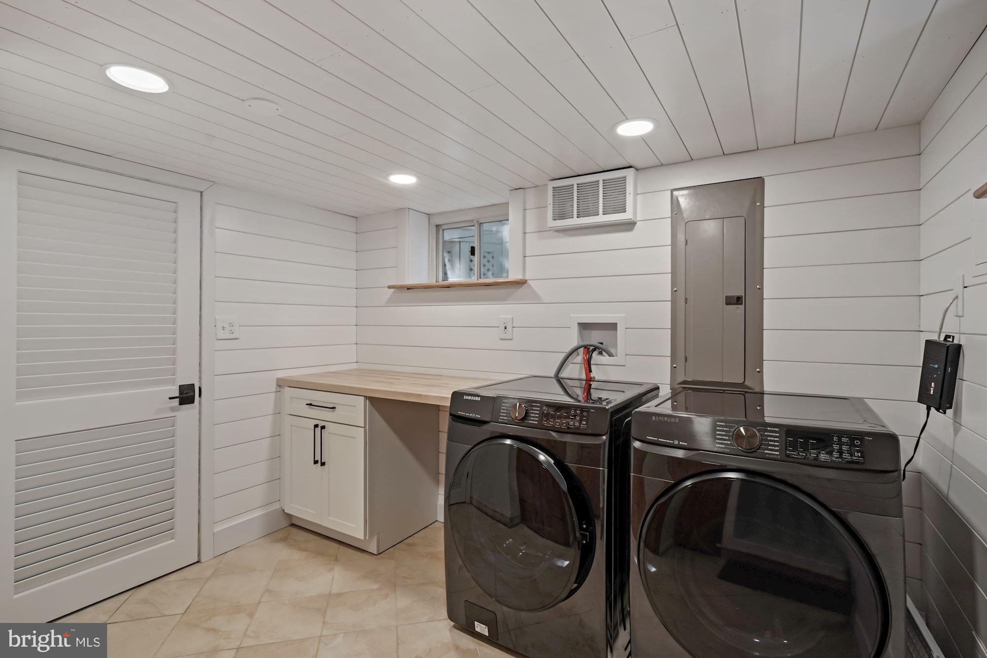 4921 Ridgewood Road Alexandria, VA 22312 - Photo 28 of 48 Updated laundry room + new front loading w/d