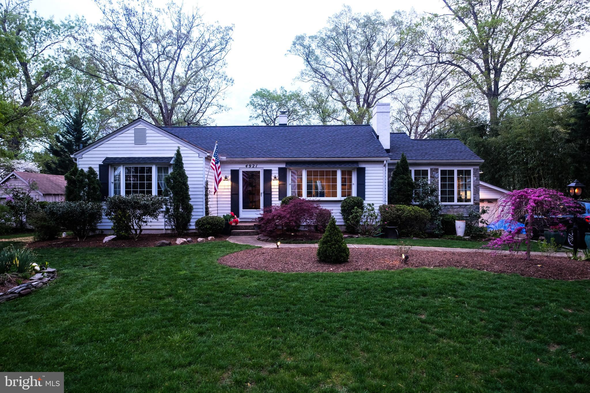 4921 Ridgewood Road Alexandria, VA 22312 - Photo 47 of 48 A view of the home in the setting sunlight