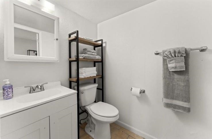 111 Kahului Beach Road, Unit B112 Kahului, HI 96732 - Photo 9 of 15 a bathroom with a sink toilet and shower