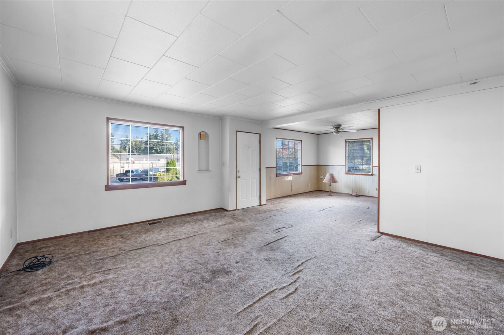 6926 East Cady Road Everett, WA 98203 - Photo 12 of 19 a view of a big room with closet and windows