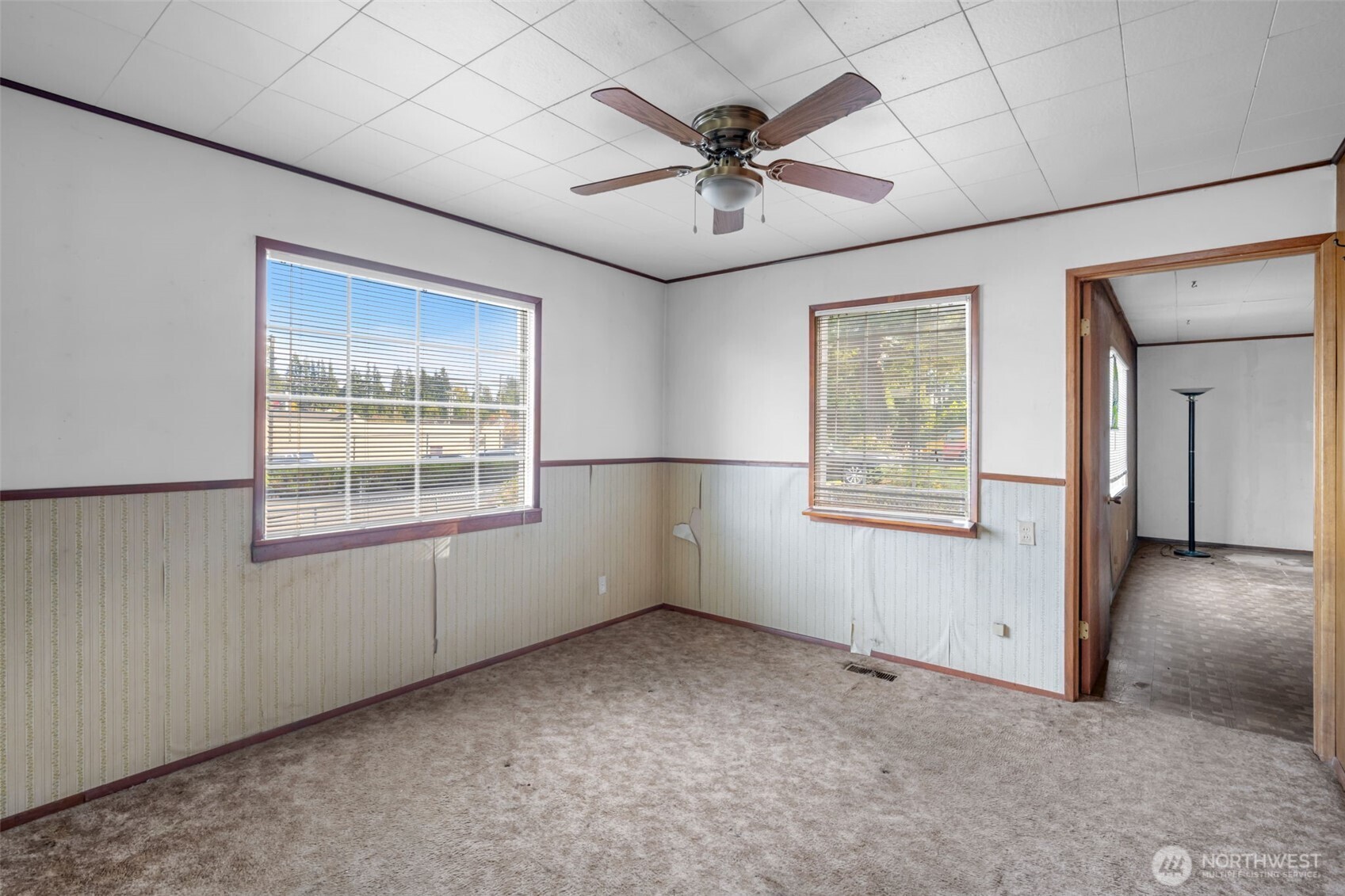 6926 East Cady Road Everett, WA 98203 - Photo 14 of 19 an empty room with windows and fan