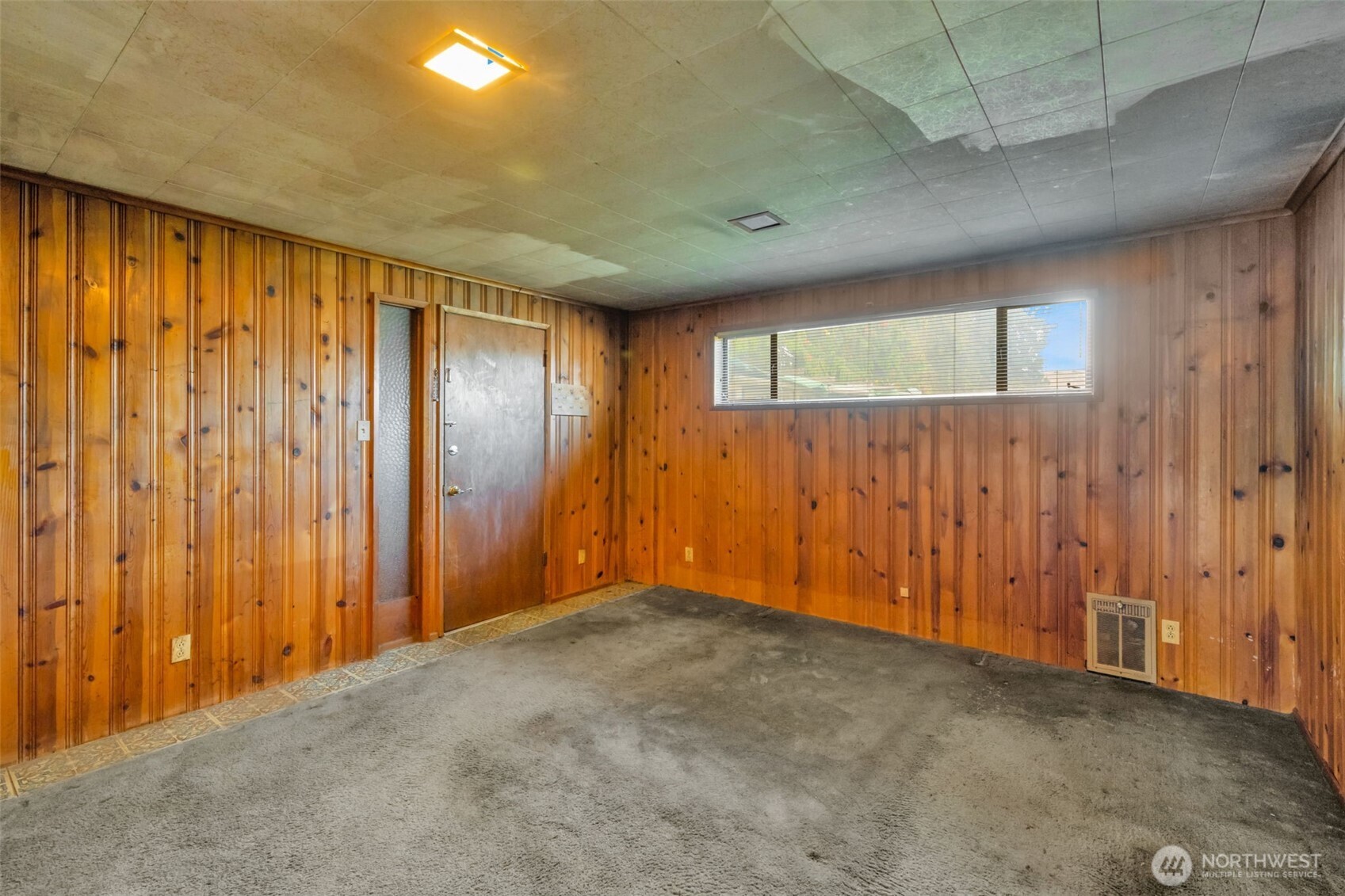 6926 East Cady Road Everett, WA 98203 - Photo 15 of 19 a view of an empty room with a window