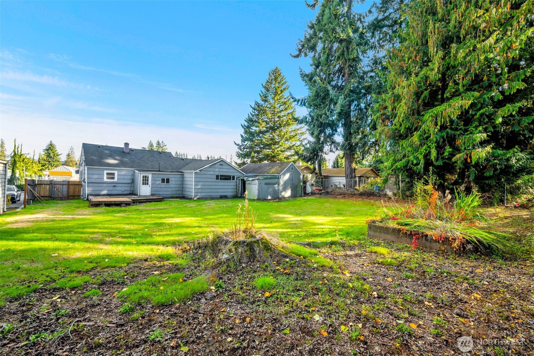 6926 East Cady Road Everett, WA 98203 - Photo 5 of 19 a view of a house with a big yard