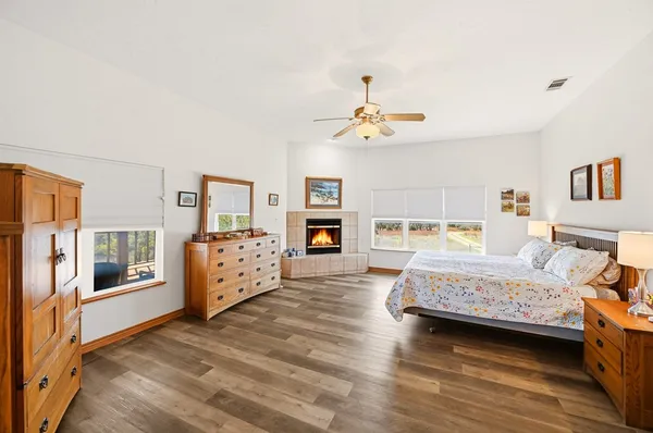 a bedroom with furniture and window