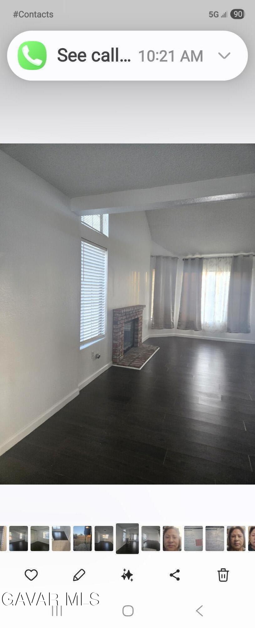 37414 Drexel Street Palmdale, CA 93550 - Photo 5 of 7 a black and white photo of a living room