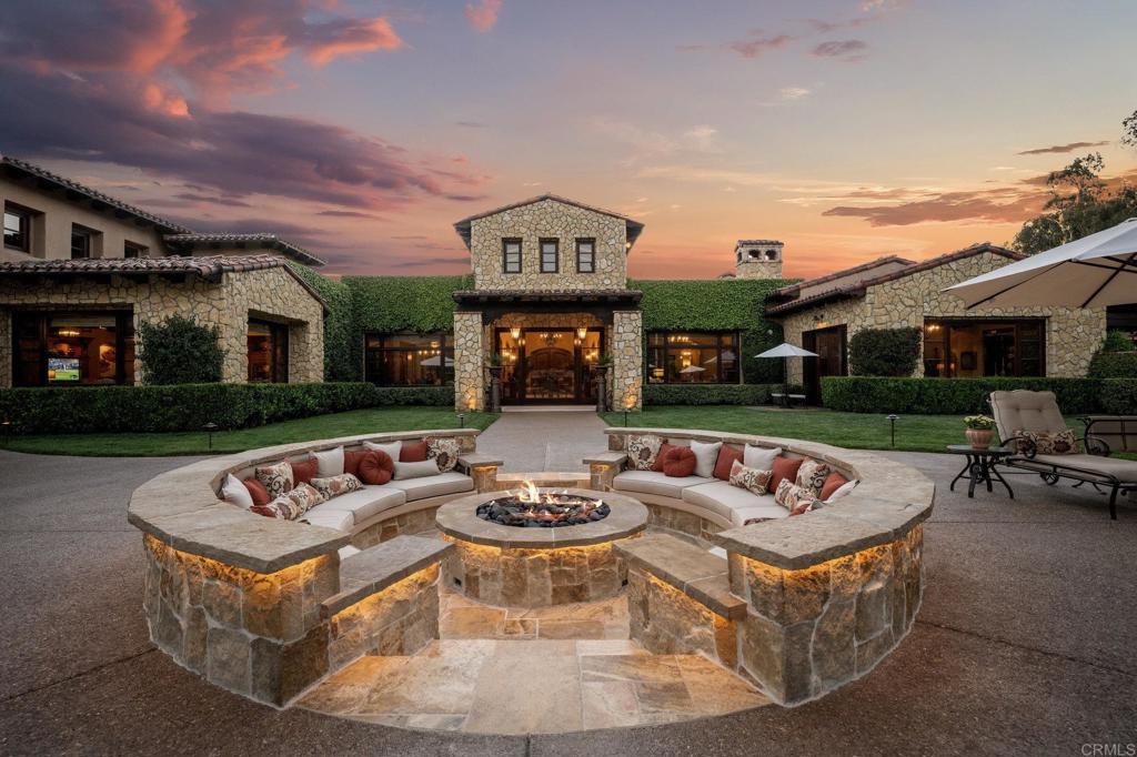 6314 El Apajo Rancho Santa Fe, CA 92067 - Photo 55 of 60 a view of a dinning table and a couches in a patio