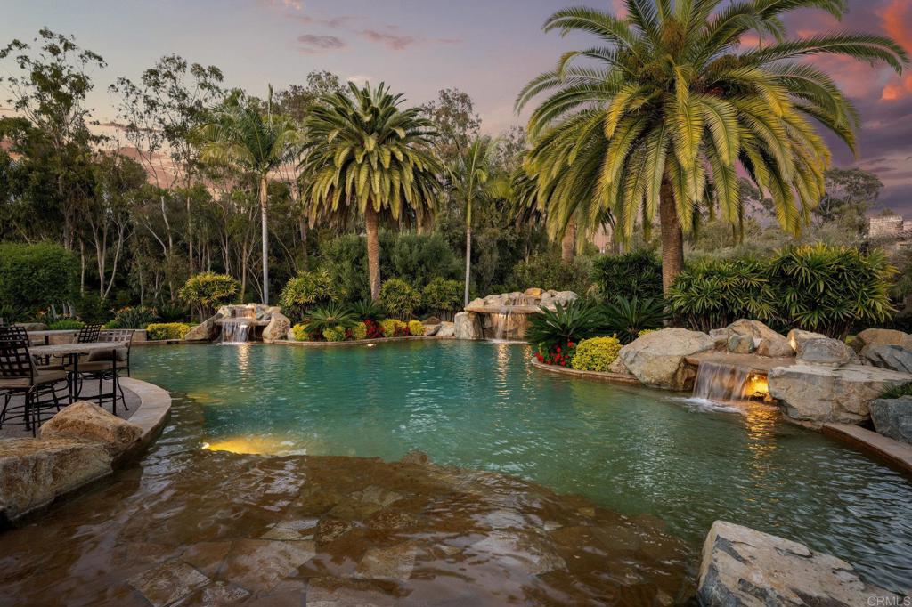 6314 El Apajo Rancho Santa Fe, CA 92067 - Photo 60 of 60 a view of swimming pool with a table and chairs
