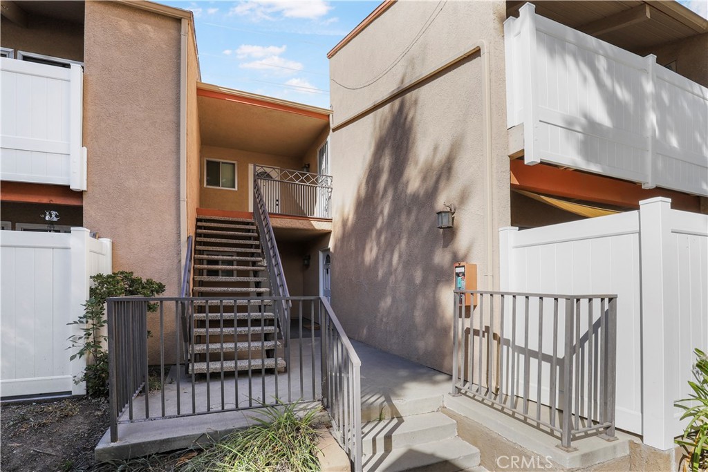 10331 Lindley Avenue, Unit 229 Porter Ranch, CA 91326 - Photo 1 of 1 a view of entryway with a front door