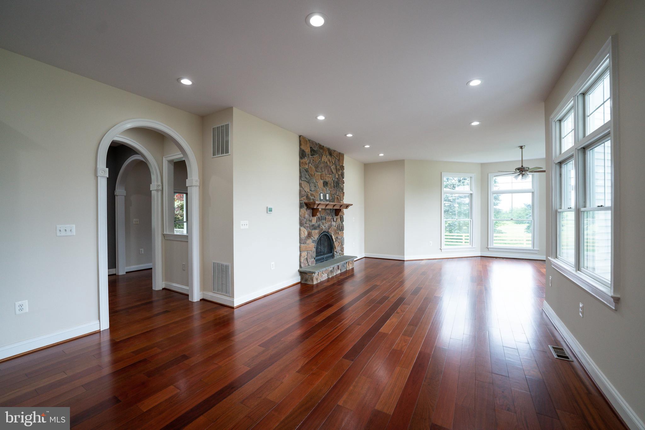 9731 Clemsonville Road Union Bridge, MD 21791 - Photo 11 of 65 huge living room with wood floors
