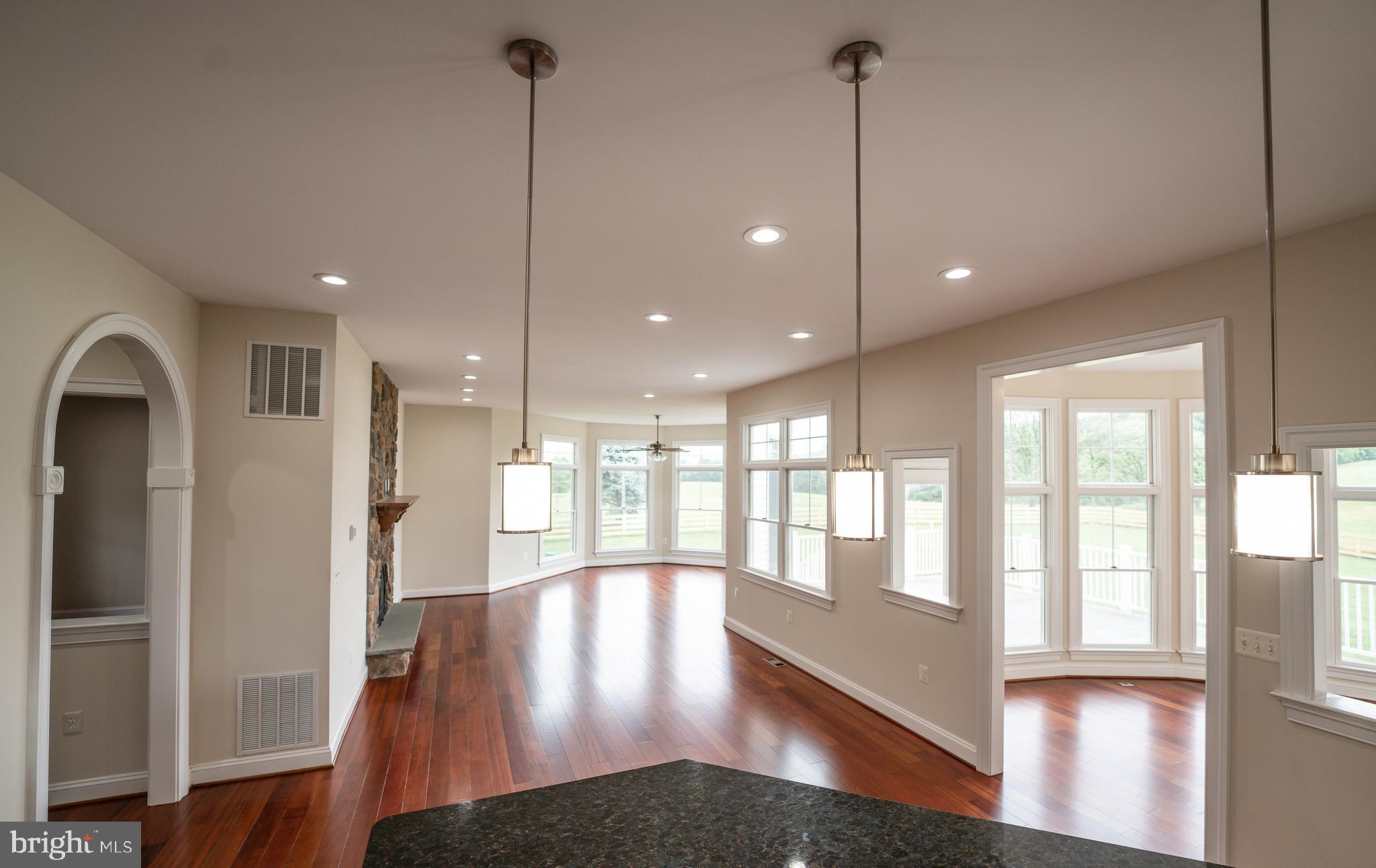 9731 Clemsonville Road Union Bridge, MD 21791 - Photo 18 of 65 kitchen bar through to living and breakfast rooms