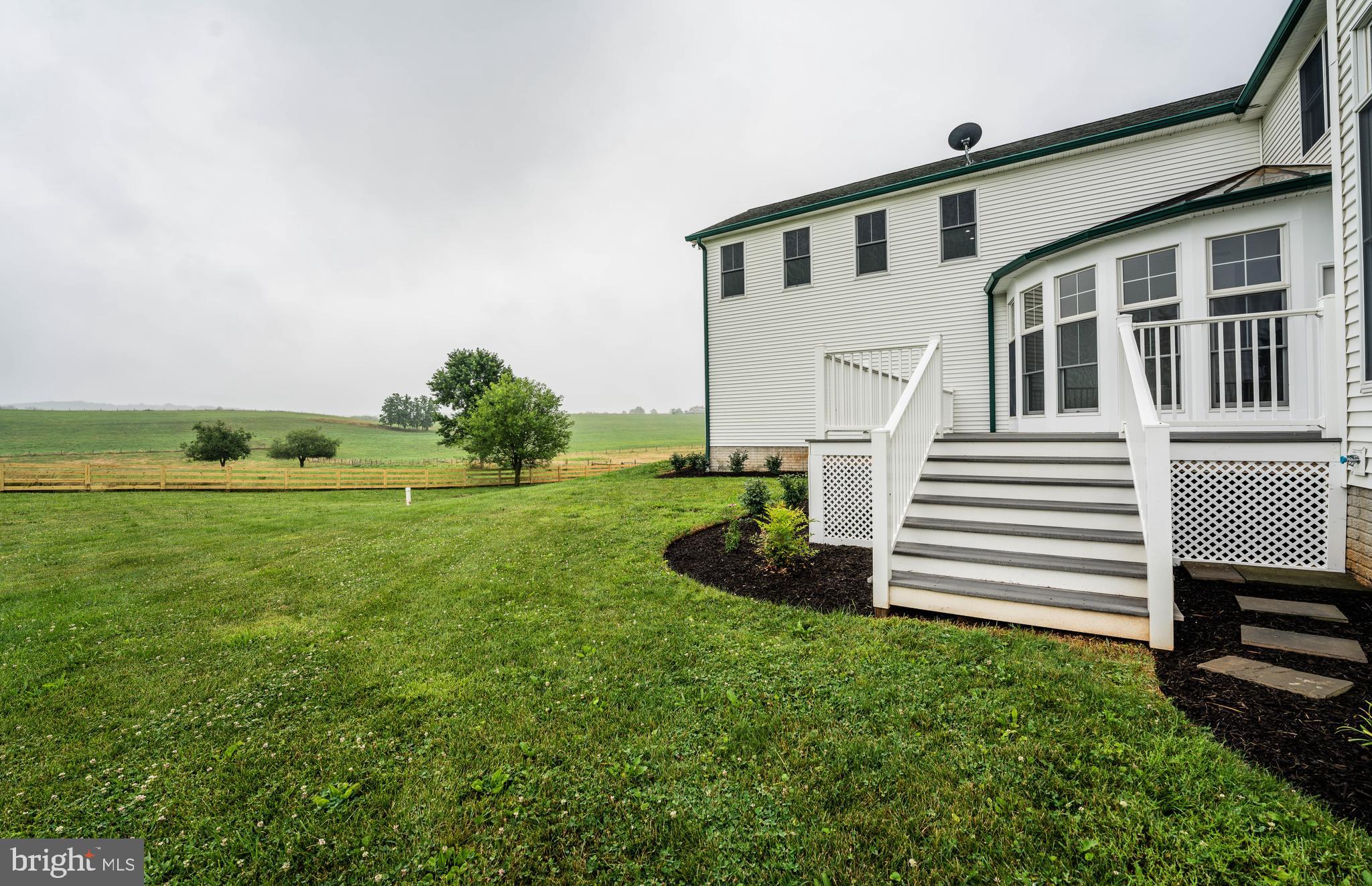 9731 Clemsonville Road Union Bridge, MD 21791 - Photo 59 of 65 deck stairs to backyard access