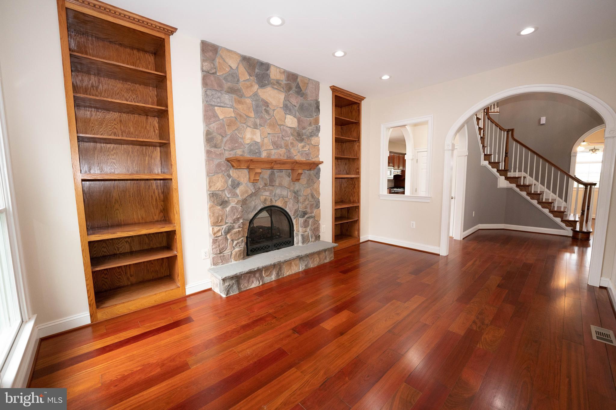 9731 Clemsonville Road Union Bridge, MD 21791 - Photo 9 of 65 front den with double-sided fireplace