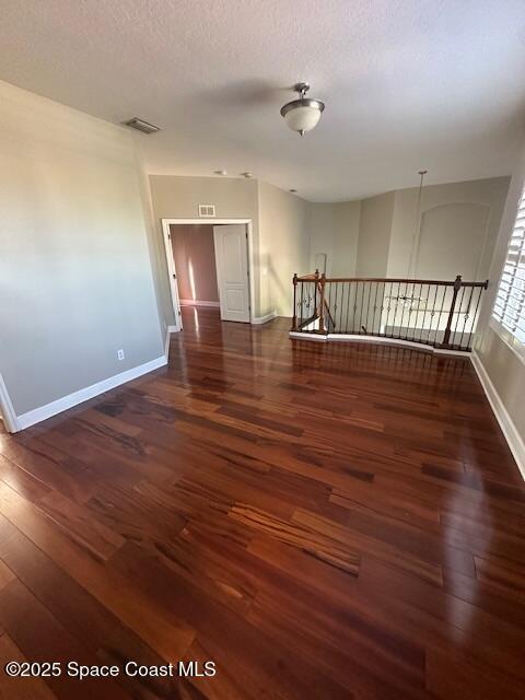 962 Balmoral Way Melbourne, FL 32940 - Photo 14 of 14 a view of an empty room with wooden floor and a window