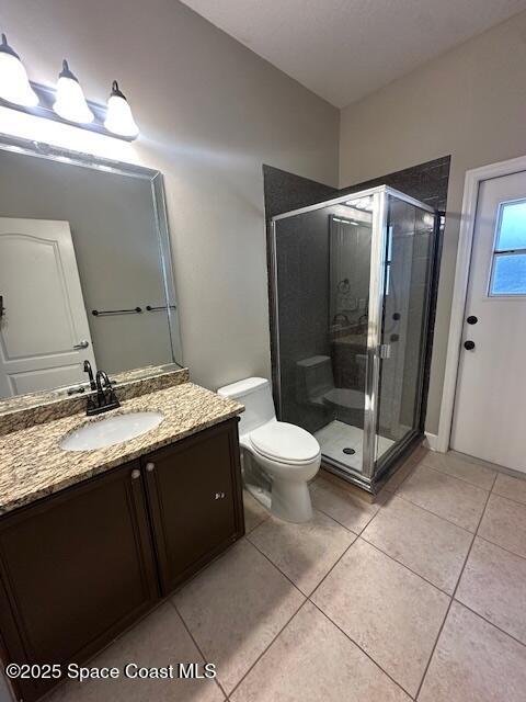 962 Balmoral Way Melbourne, FL 32940 - Photo 7 of 14 a bathroom with a granite countertop sink toilet and shower