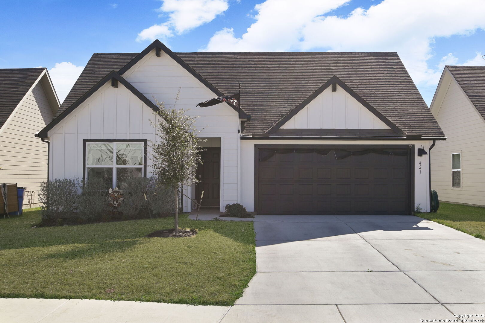 421 Signe Seguin, TX 78155 - Photo 1 of 1 a front view of a house with garden