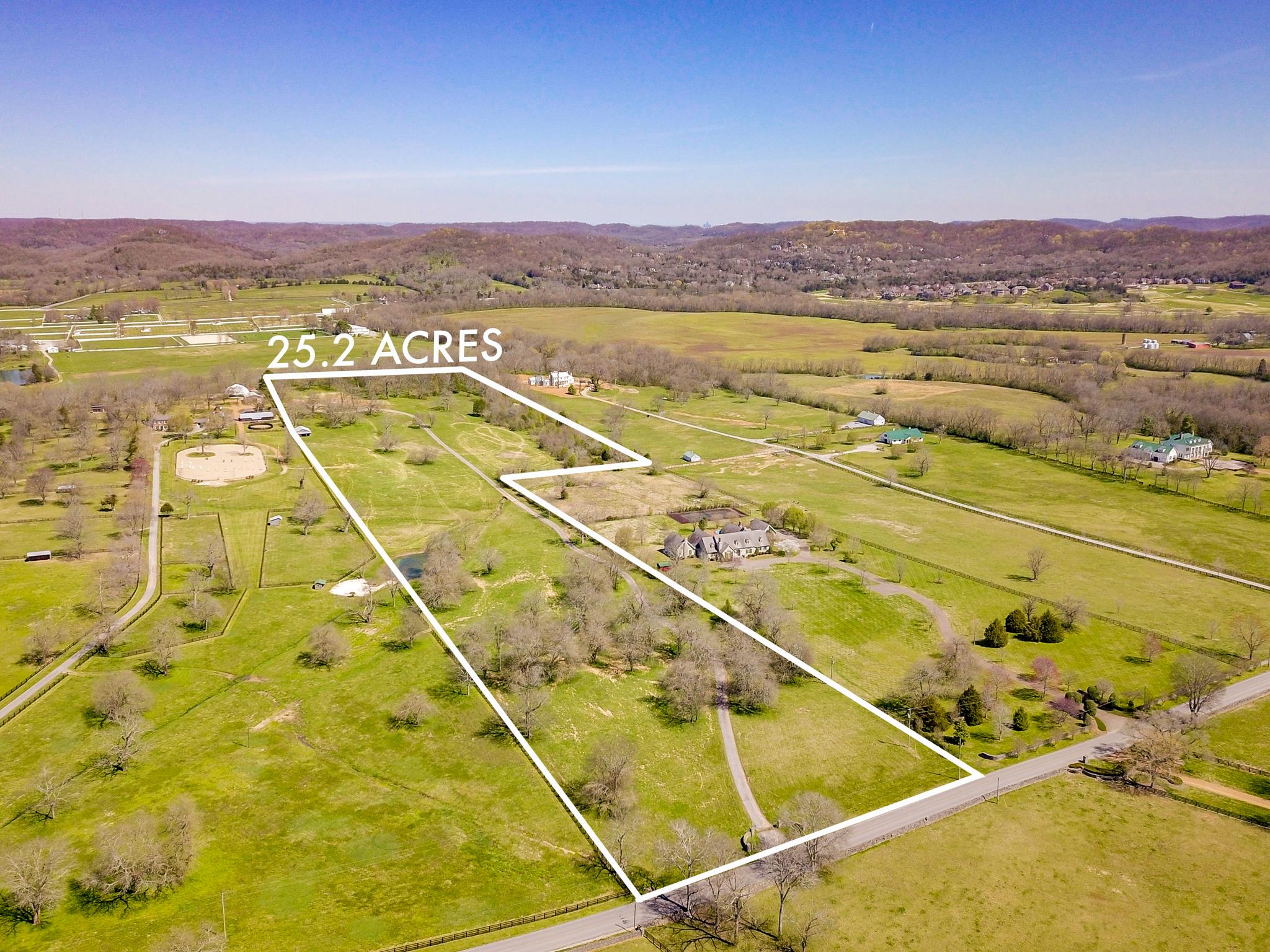 1418 Moran Road Franklin, TN 37069 - Photo 1 of 7 a view of an pool and a table