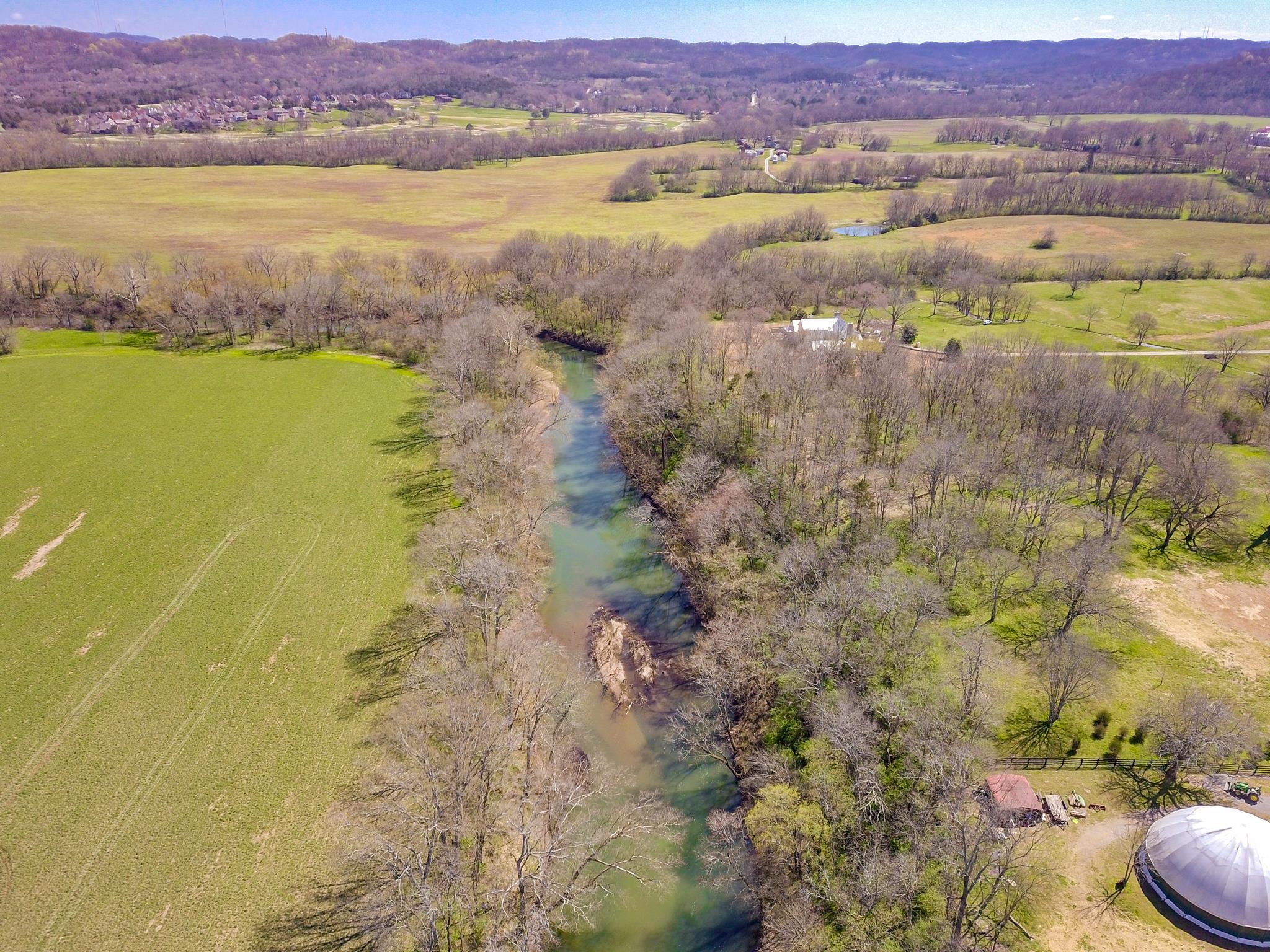 1418 Moran Road Franklin, TN 37069 - Photo 6 of 7 a view of an ocean and a mountain