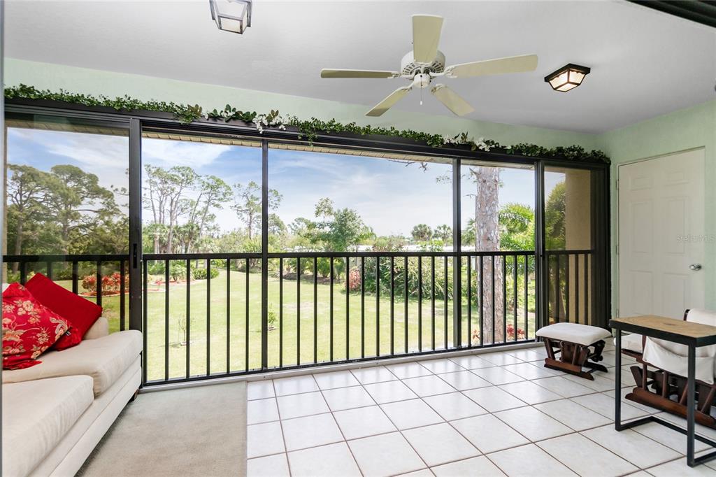 4260 Placida Road, Unit 9B Englewood, FL 34224 - Photo 21 of 38 a view of a living room and a balcony