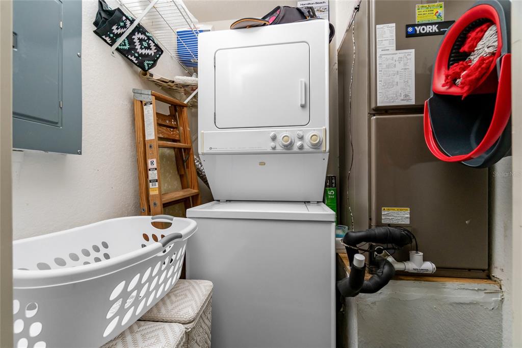 4260 Placida Road, Unit 9B Englewood, FL 34224 - Photo 23 of 38 a bathroom with a sink toilet and mirror