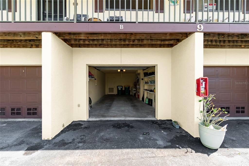4260 Placida Road, Unit 9B Englewood, FL 34224 - Photo 25 of 38 a view of a porch with a table and a potted plant