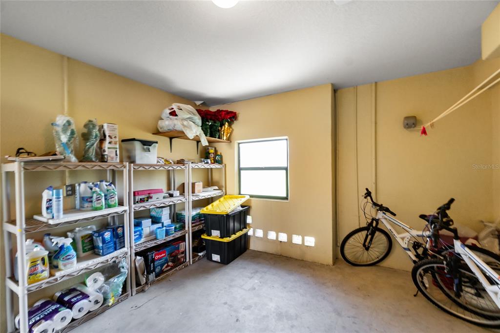 4260 Placida Road, Unit 9B Englewood, FL 34224 - Photo 27 of 38 a view of storage and utility room