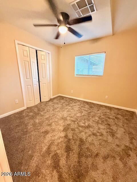 324 South Ocotillo Drive Apache Junction, AZ 85120 - Photo 11 of 14 an empty room with wooden floor and windows