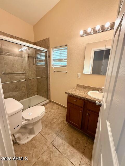 324 South Ocotillo Drive Apache Junction, AZ 85120 - Photo 10 of 14 a bathroom with a toilet a sink and a shower