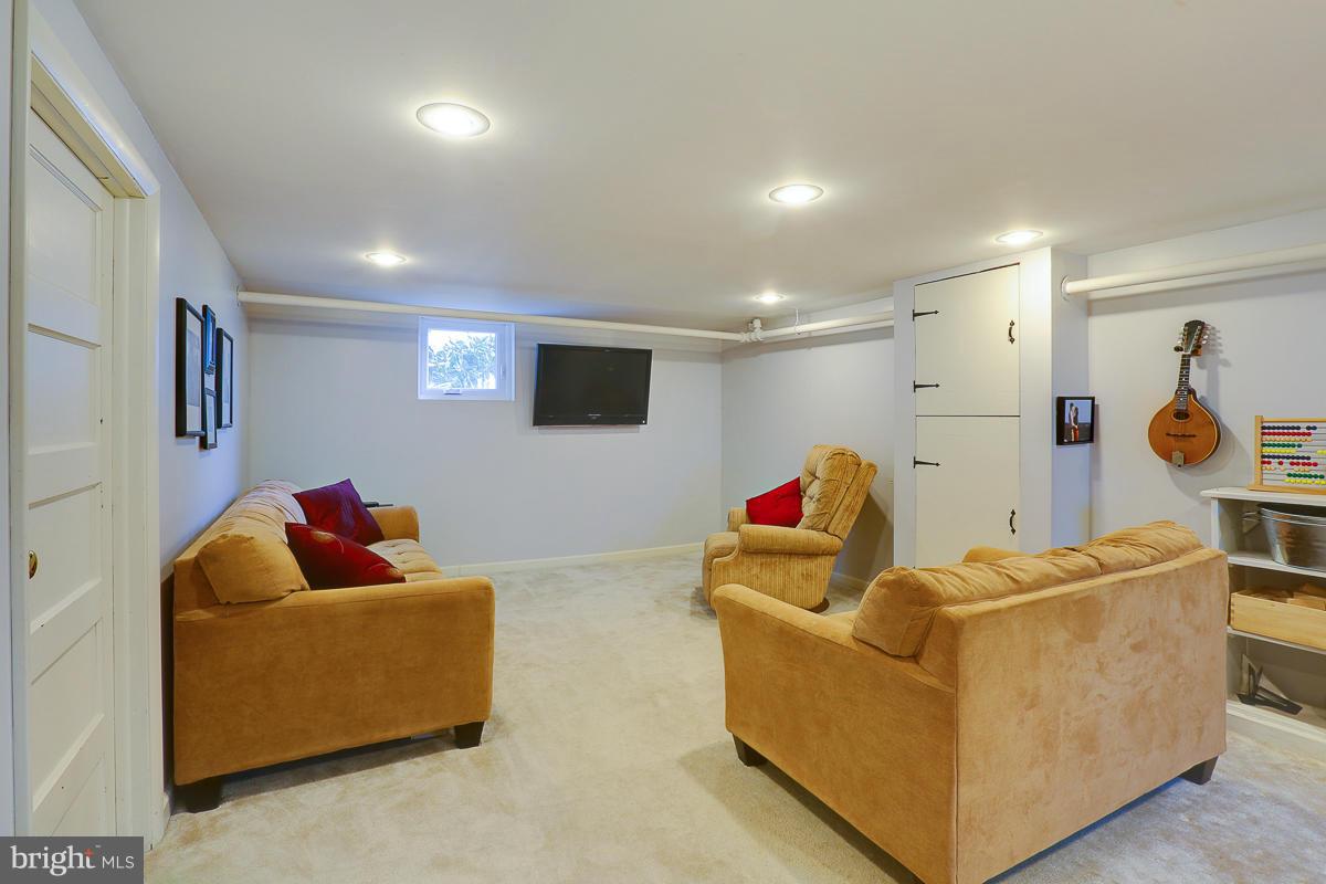 21 Ridge Road Catonsville, MD 21228 - Photo 19 of 25 Lower level rec room
