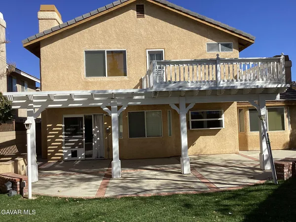 a view of house with roof deck