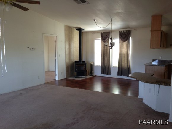 3258 North Double A Rnch Road Williams, AZ 86046 - Photo 11 of 18 a view of a livingroom with furniture and an empty room