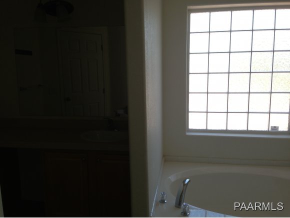 3258 North Double A Rnch Road Williams, AZ 86046 - Photo 8 of 18 a view of a bathroom with a window