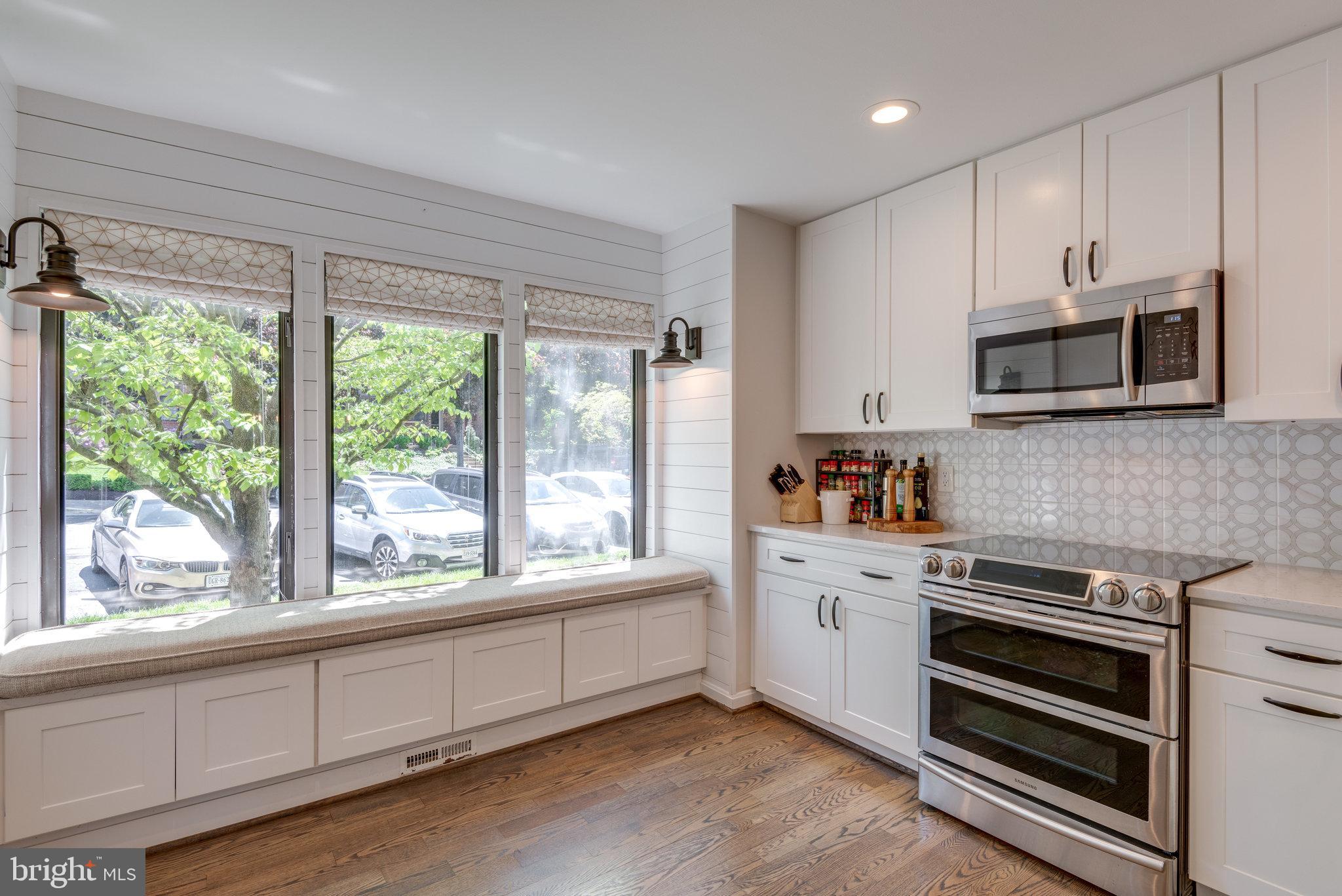10998 Thrush Ridge Road Reston, VA 20191 - Photo 11 of 40 Custom window seat with shiplap wall detail