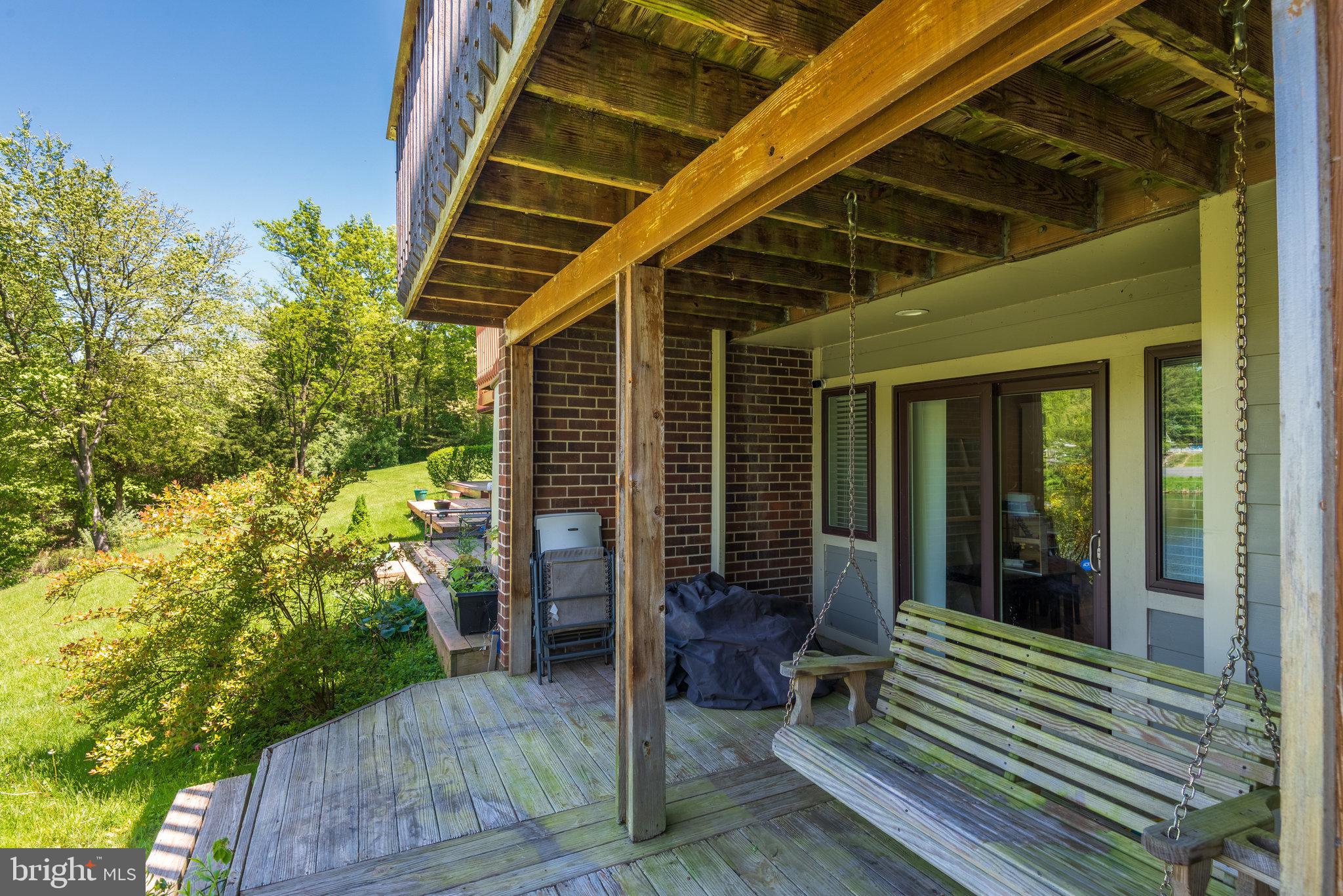 10998 Thrush Ridge Road Reston, VA 20191 - Photo 34 of 40 Wood lower level deck perfect for lounging