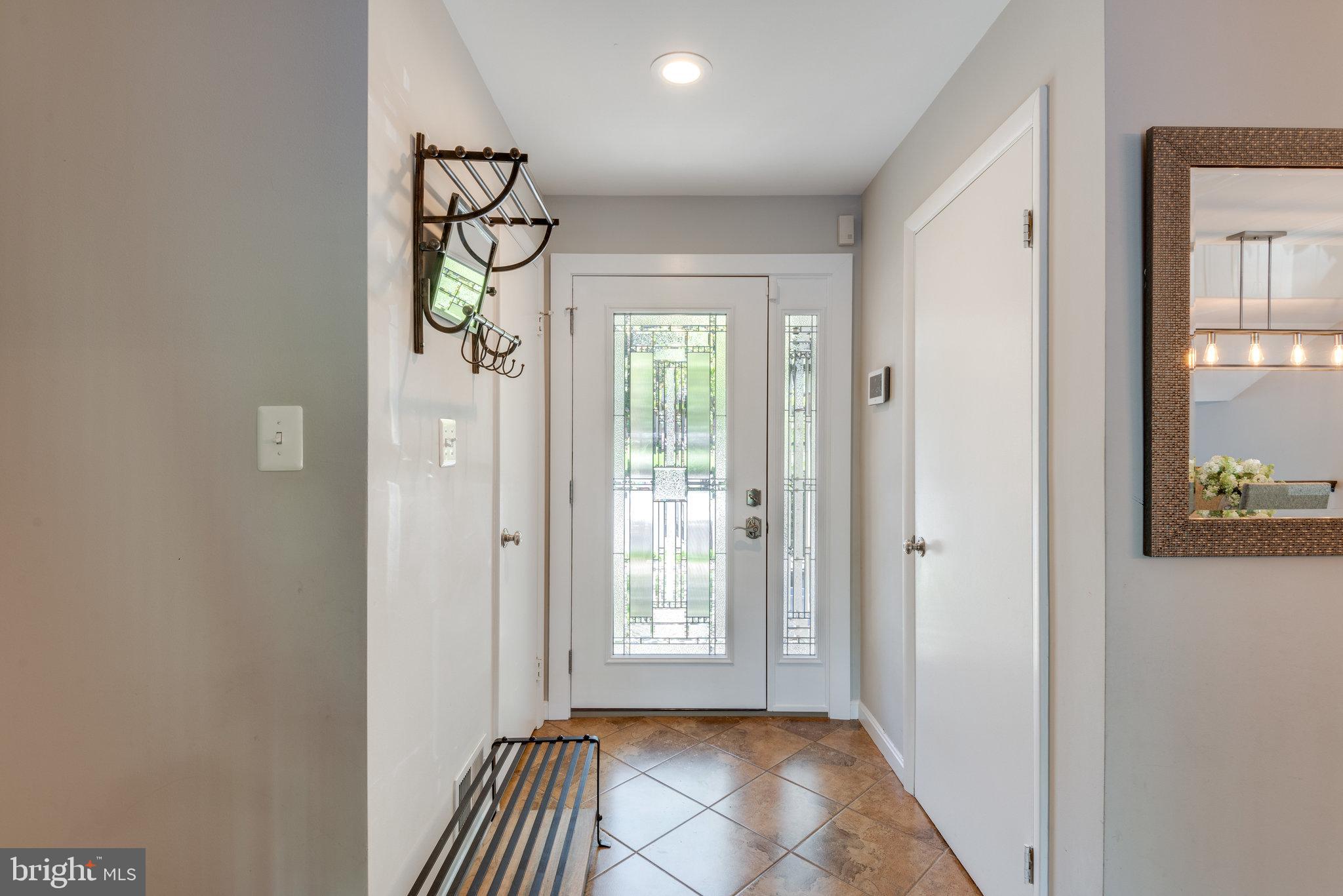 10998 Thrush Ridge Road Reston, VA 20191 - Photo 6 of 40 Tile floor entrance