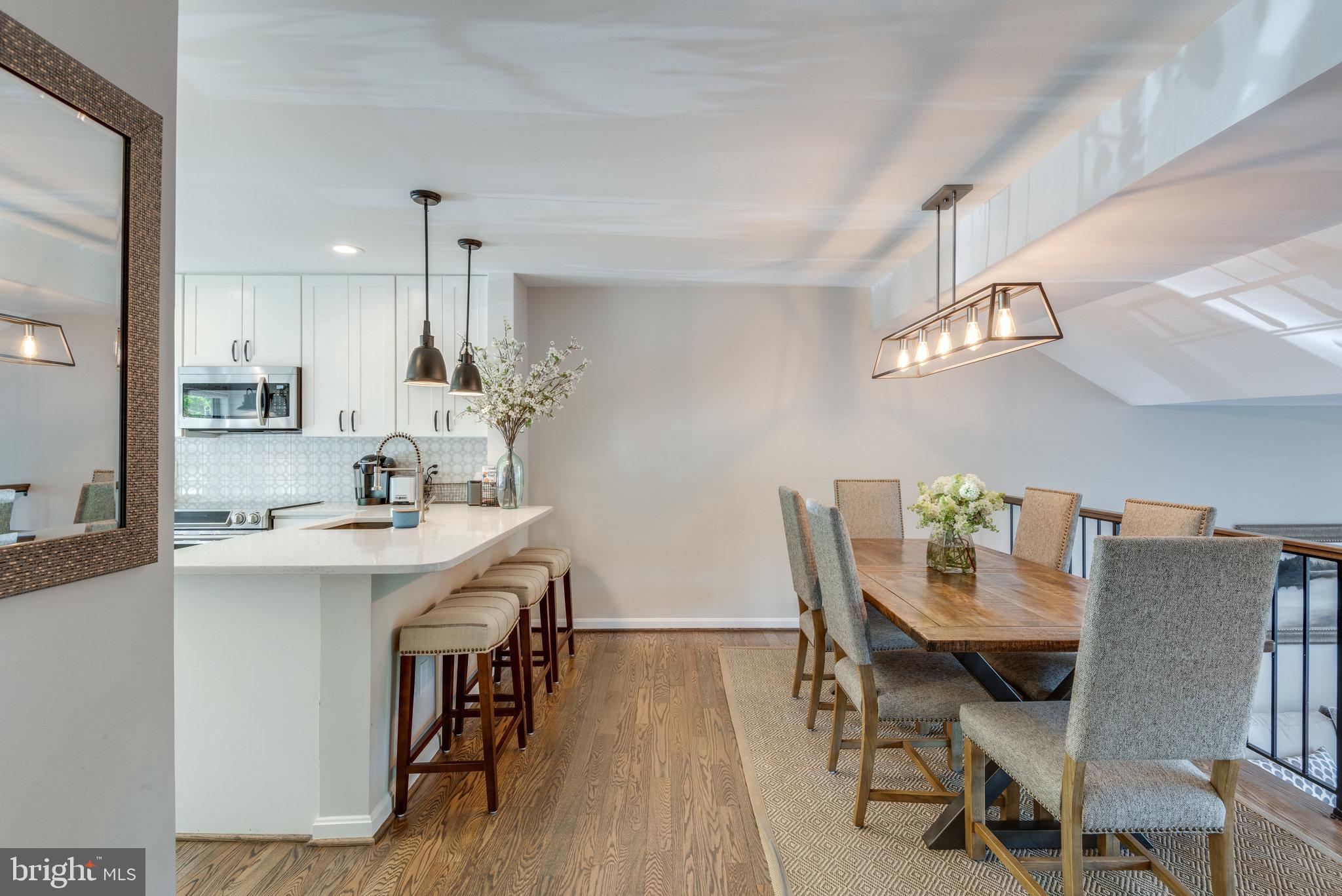 10998 Thrush Ridge Road Reston, VA 20191 - Photo 7 of 40 Kitchen breakfast bar has room for stools