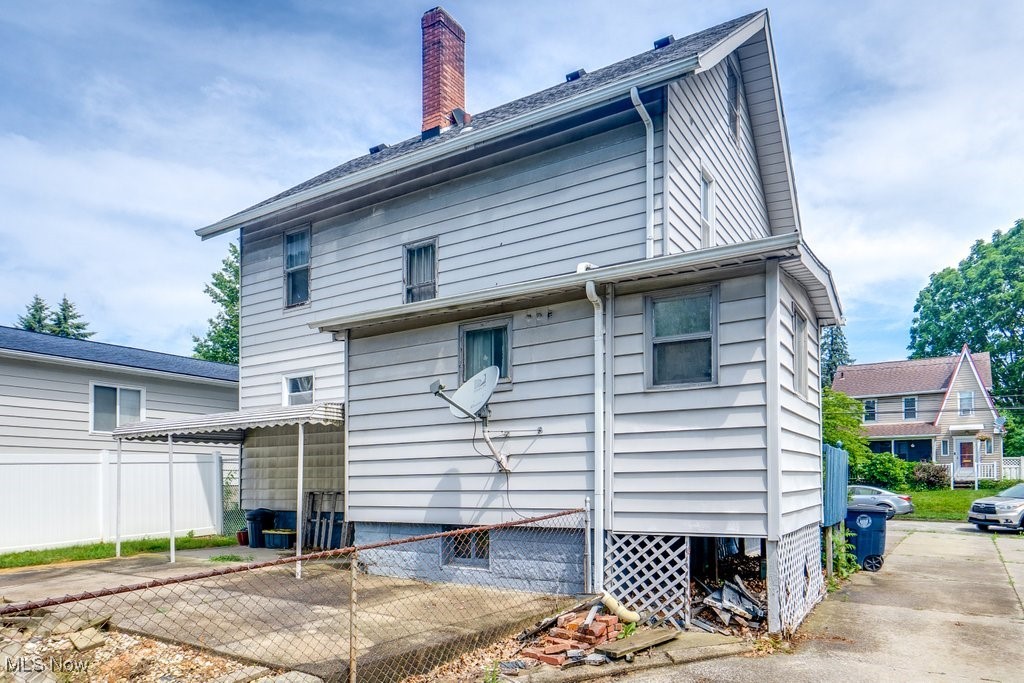 516 Floyd Street Akron, OH 44310 - Photo 45 of 50 Rear view of house featuring a chimney