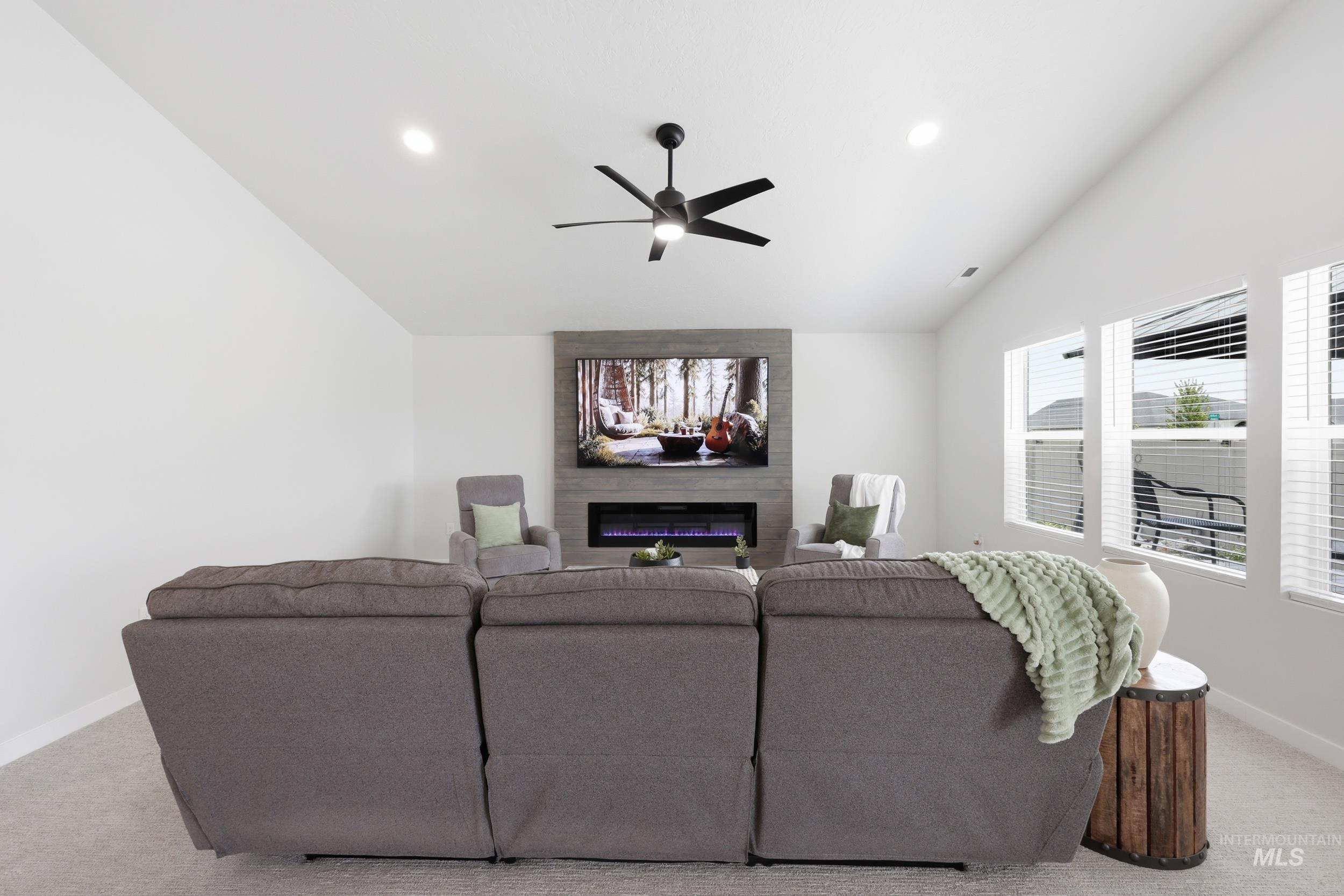 3665 W Lane Meridian, ID 83642 - Photo 21 of 42 Spacious bedroom featuring light-toned carpeting and a ceiling fan with integrated lighting