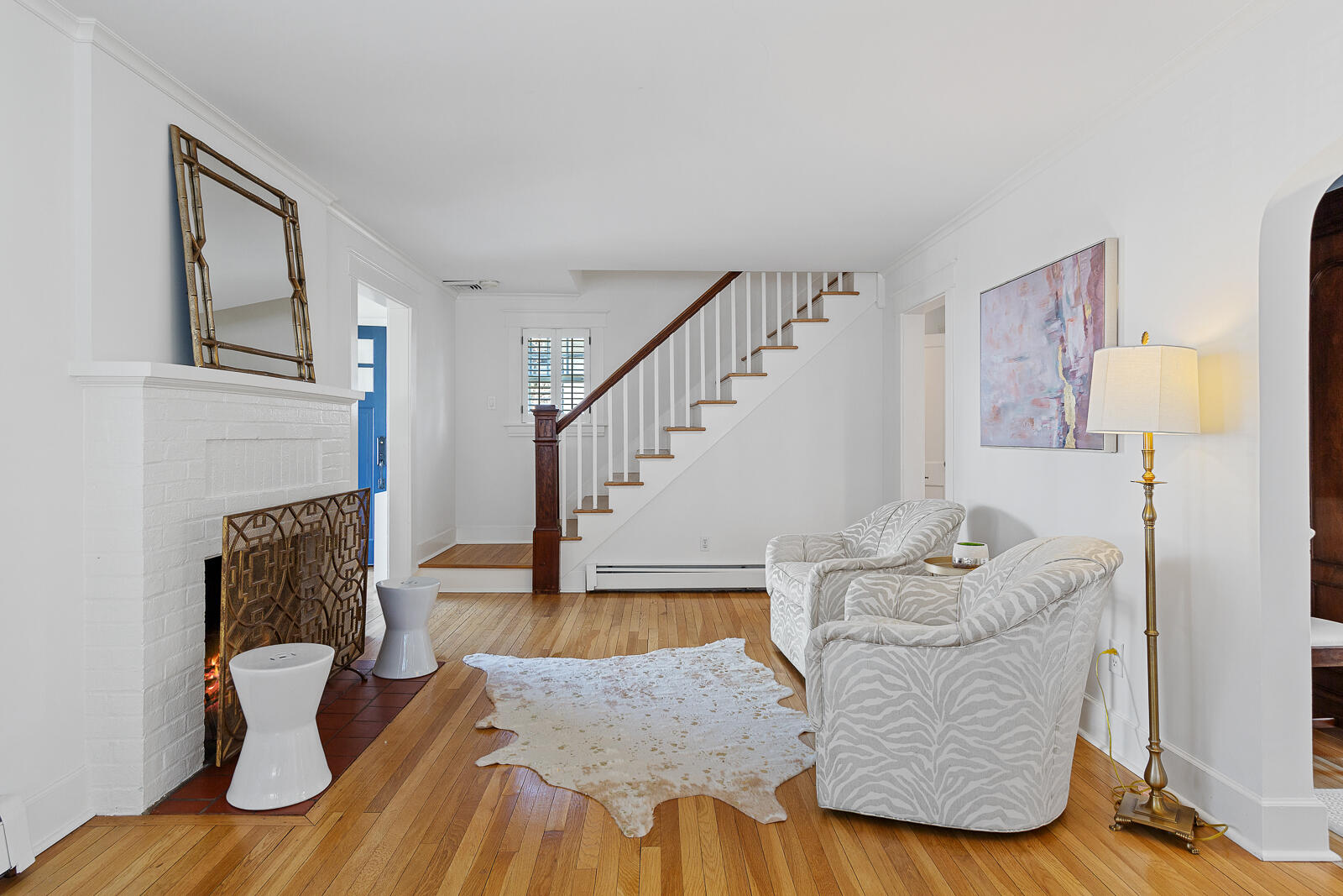 70 Middlesex Road Darien, CT 06820 - Photo 11 of 36 a living room with furniture and a stairs