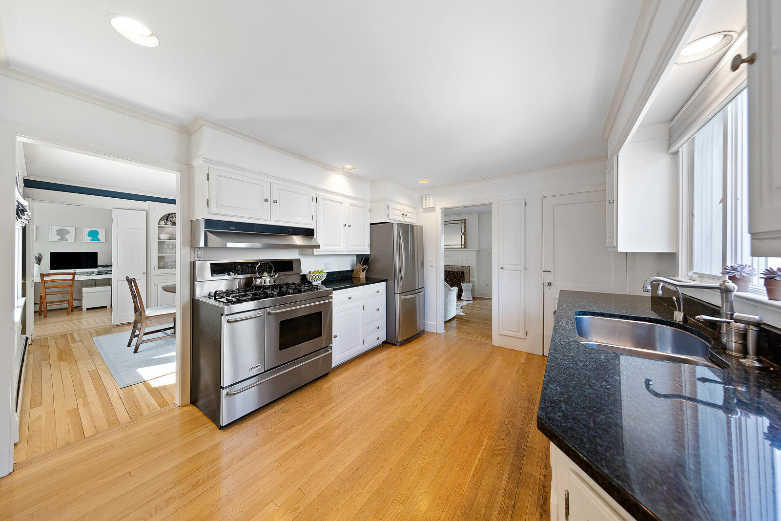 70 Middlesex Road Darien, CT 06820 - Photo 17 of 36 a kitchen with granite countertop a sink and stainless steel appliances