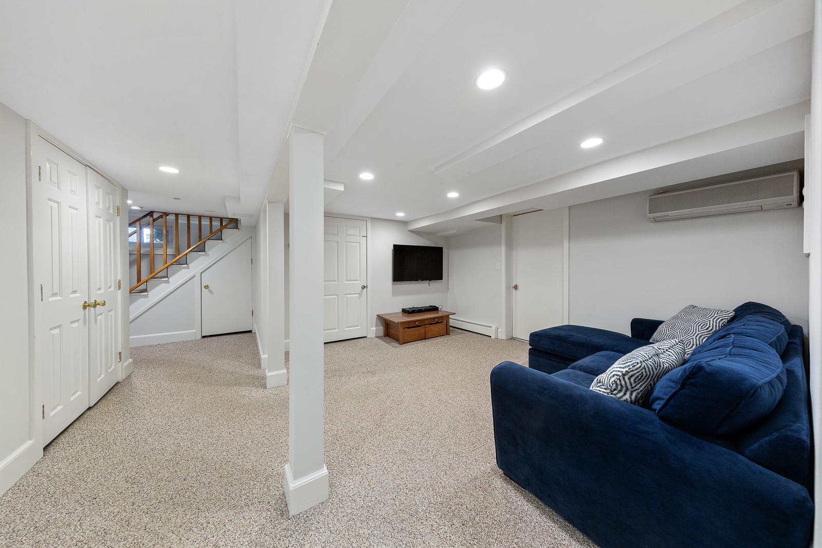 70 Middlesex Road Darien, CT 06820 - Photo 26 of 36 a living room with furniture and a flat screen tv