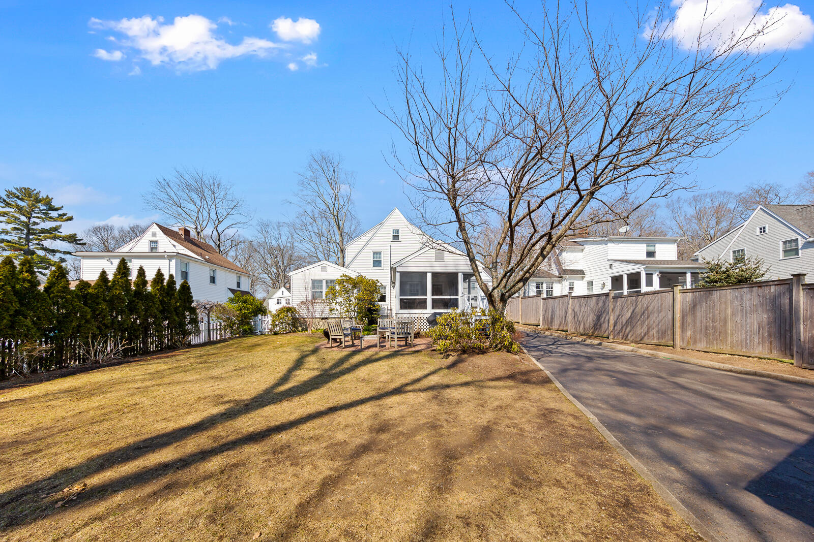 70 Middlesex Road Darien, CT 06820 - Photo 30 of 36 a view of house with yard and trees in the background